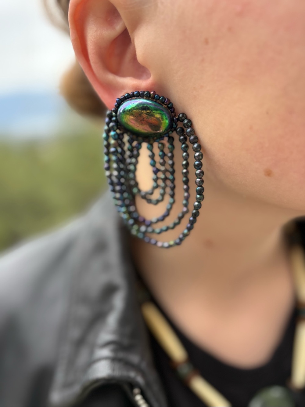 Big Iridescent Cabochon With Muilt Strand Dark Metallic Seed Beads